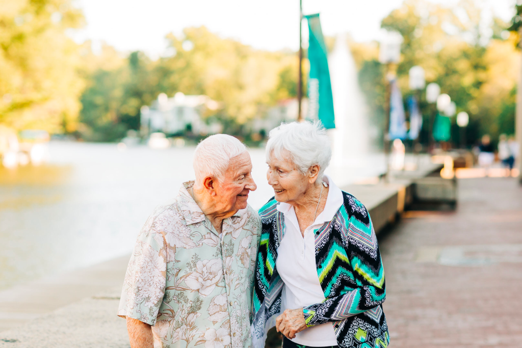 elderly couple walking together