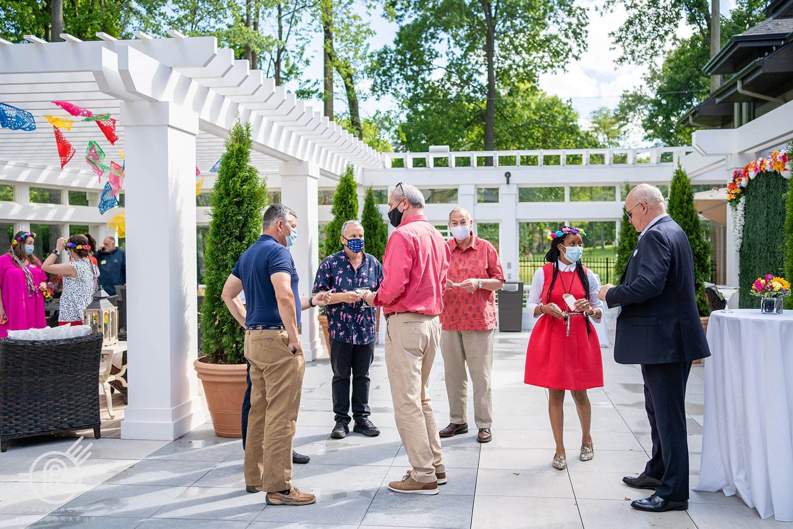 team member gathering on patio