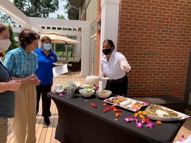 appetizers being served at community event