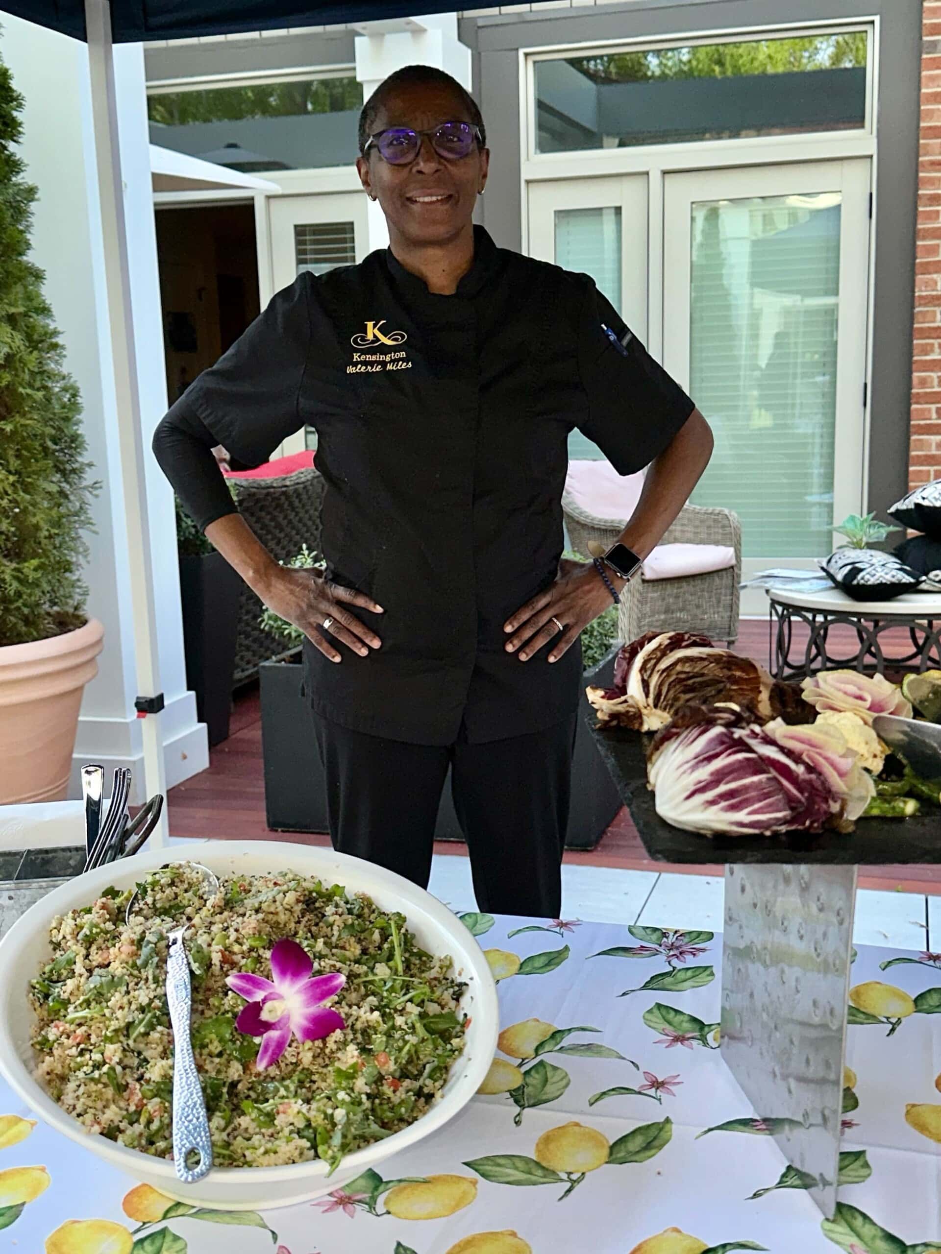 culinary team member with meal