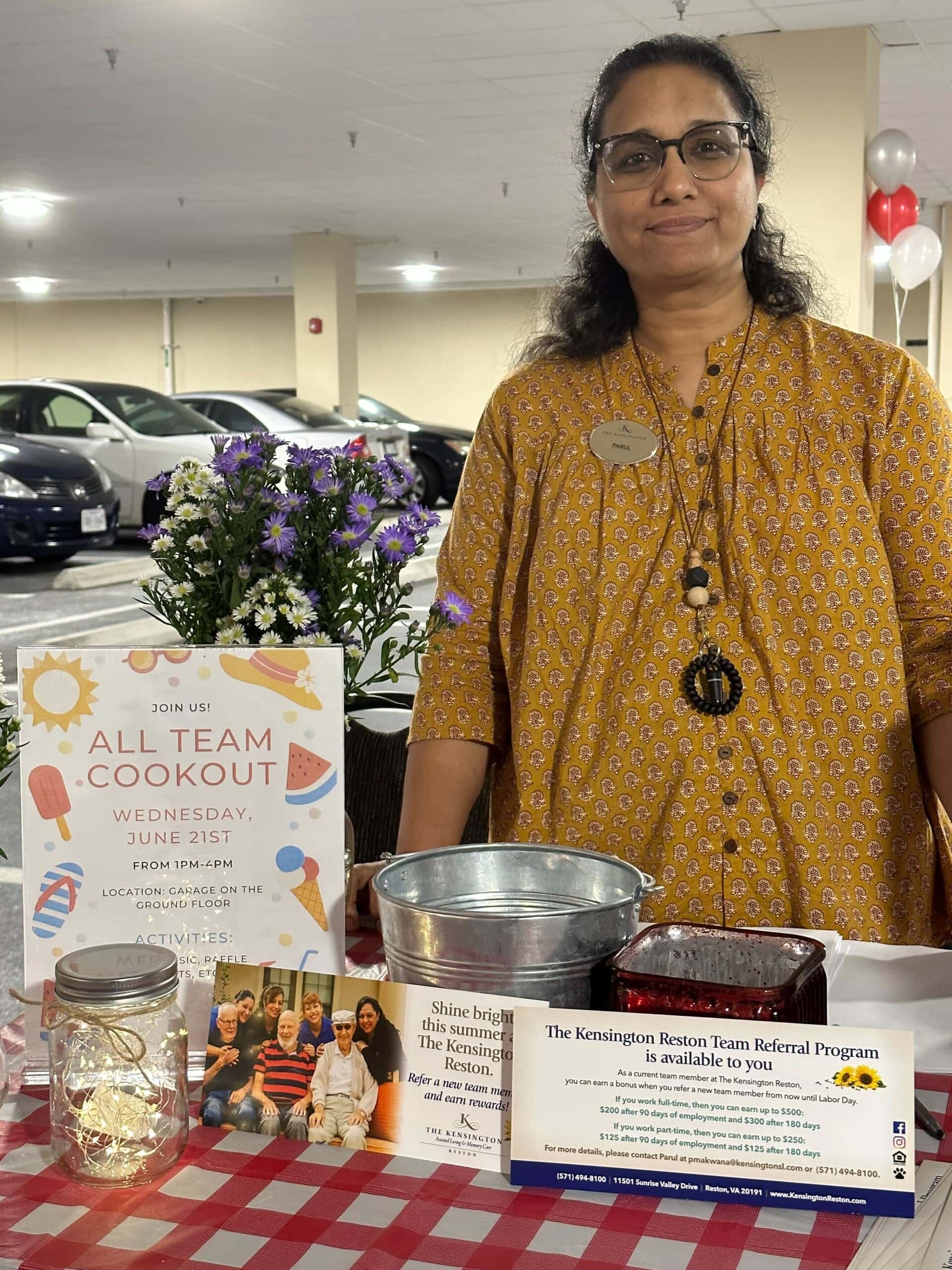 team member with table setup