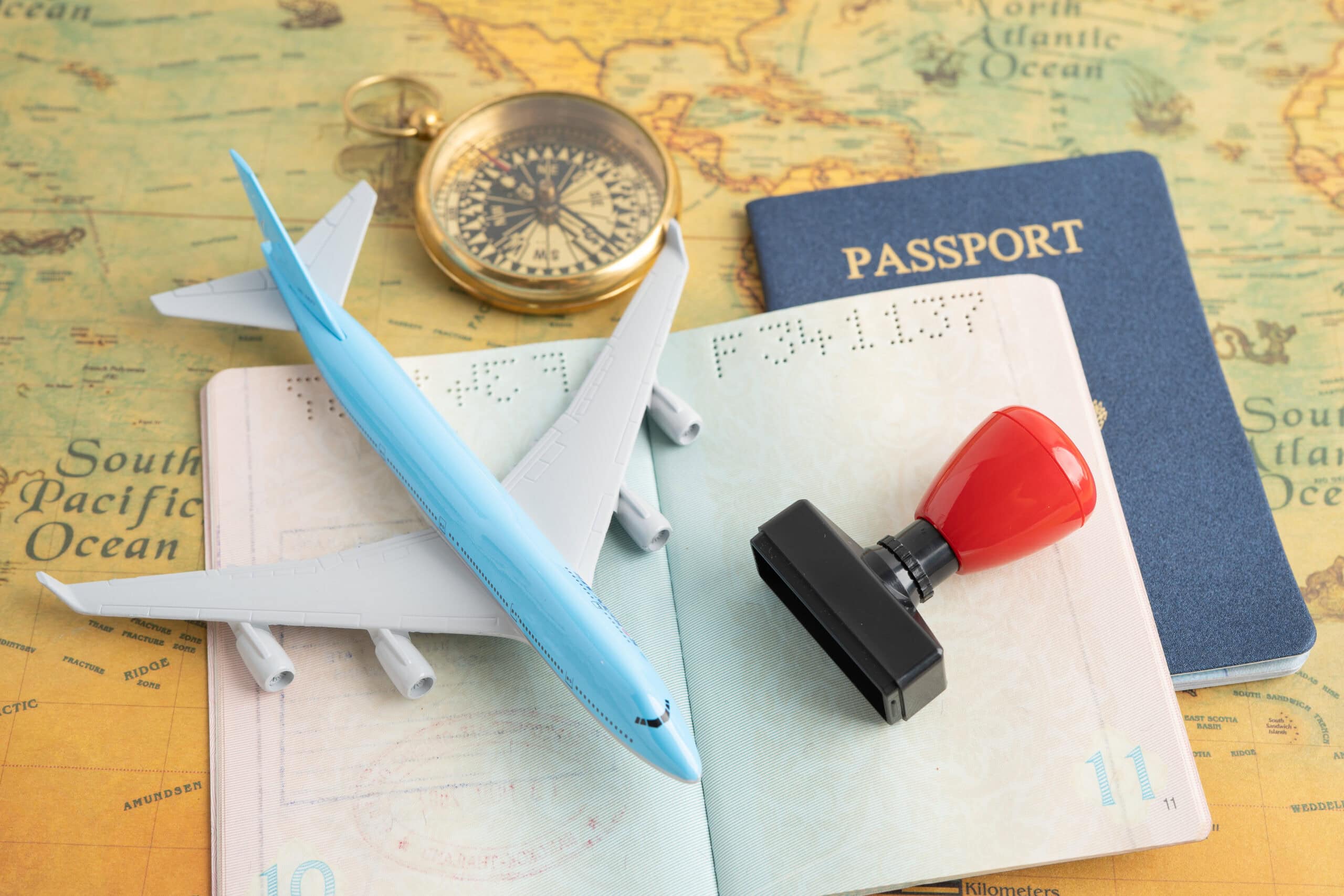 Approved Stamp visa and passport document to immigration at airport in country.