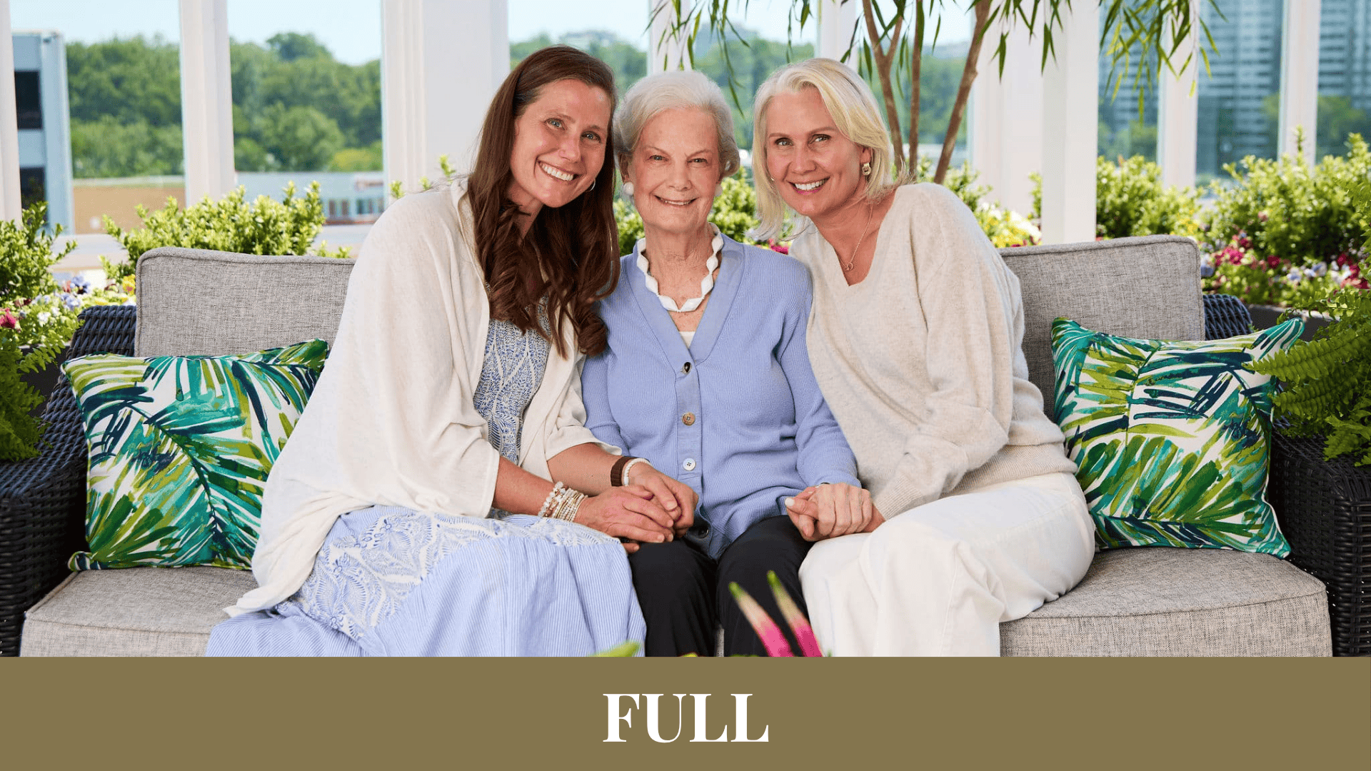 Senior mother with her adult daughters